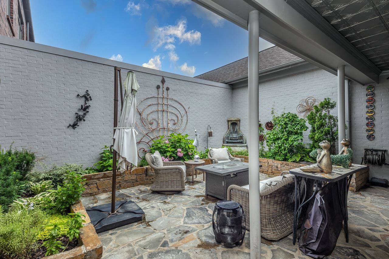 573 South Front Street Memphis, TN 38103 - Photo 33 of 40 a outdoor space with lots of potted plants