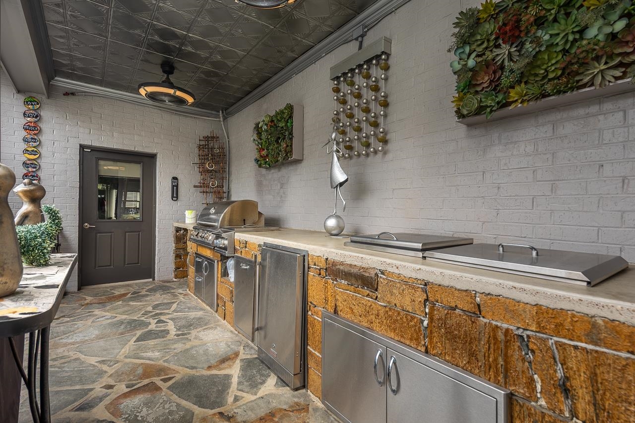 573 South Front Street Memphis, TN 38103 - Photo 34 of 40 a kitchen with a sink and cabinets