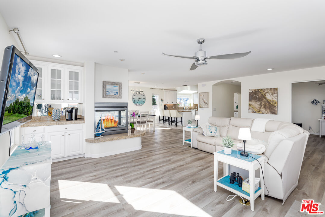 5101 Breakwater Way Oxnard, CA 93035 - Photo 14 of 39 a living room with furniture and a fireplace