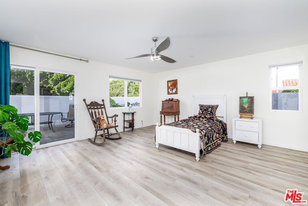 5101 Breakwater Way Oxnard, CA 93035 - Photo 25 of 39 a living room with furniture and a wooden floor