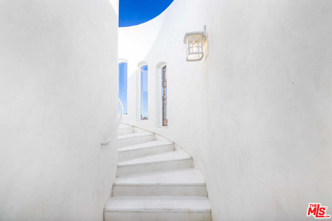 5101 Breakwater Way Oxnard, CA 93035 - Photo 30 of 39 a view of staircase with white walls