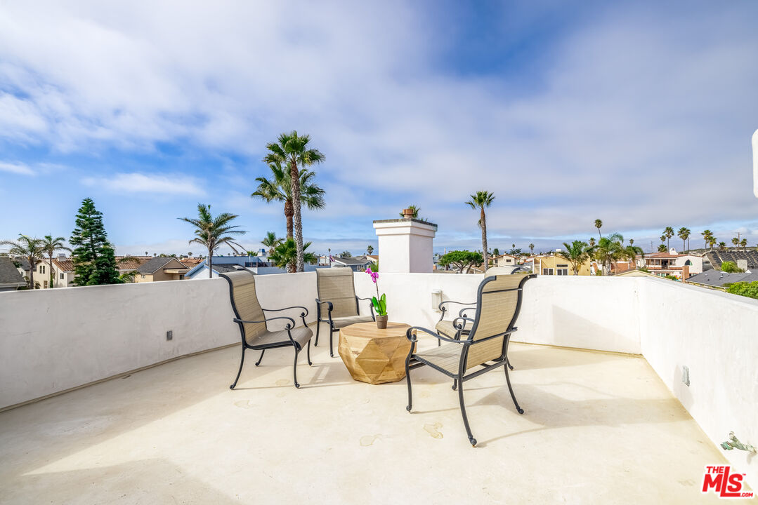 5101 Breakwater Way Oxnard, CA 93035 - Photo 31 of 39 a view of a chairs and table in the terrace