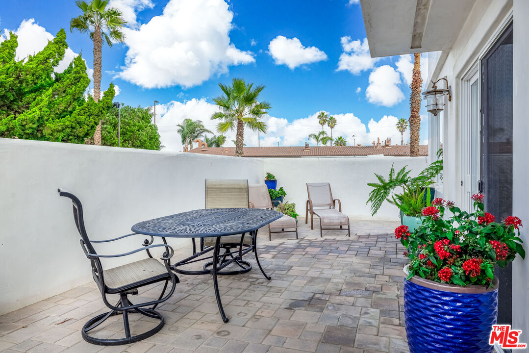 5101 Breakwater Way Oxnard, CA 93035 - Photo 36 of 39 a view of a chairs and table in the patio