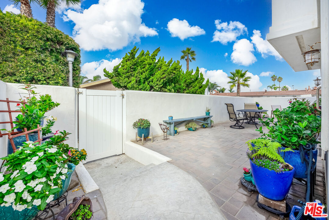 5101 Breakwater Way Oxnard, CA 93035 - Photo 37 of 39 a view of a backyard with plants and outdoor seating