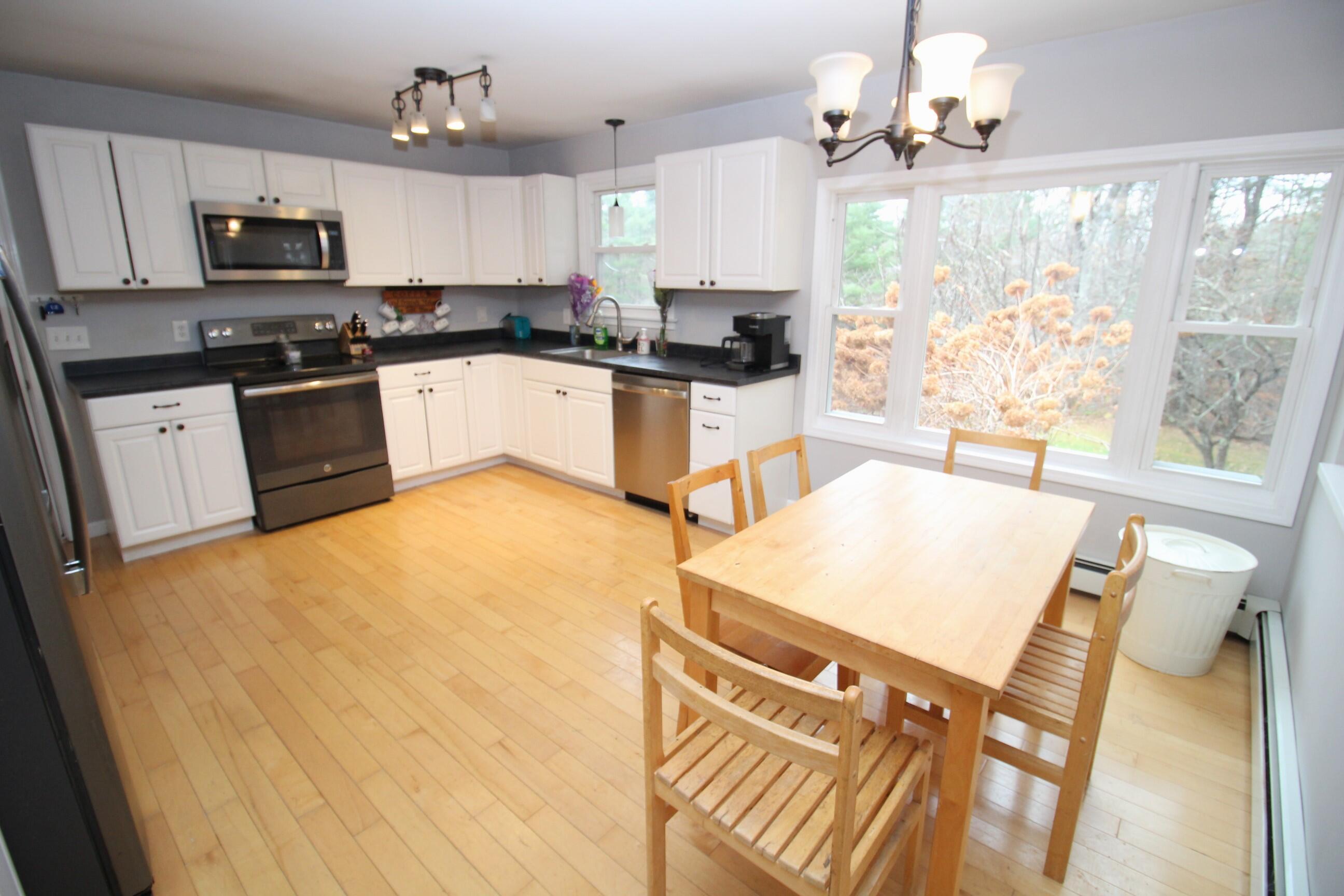 403 Quaker Ridge Road Greene, ME 04236 - Photo 5 of 59 5. Kitchen & Dining