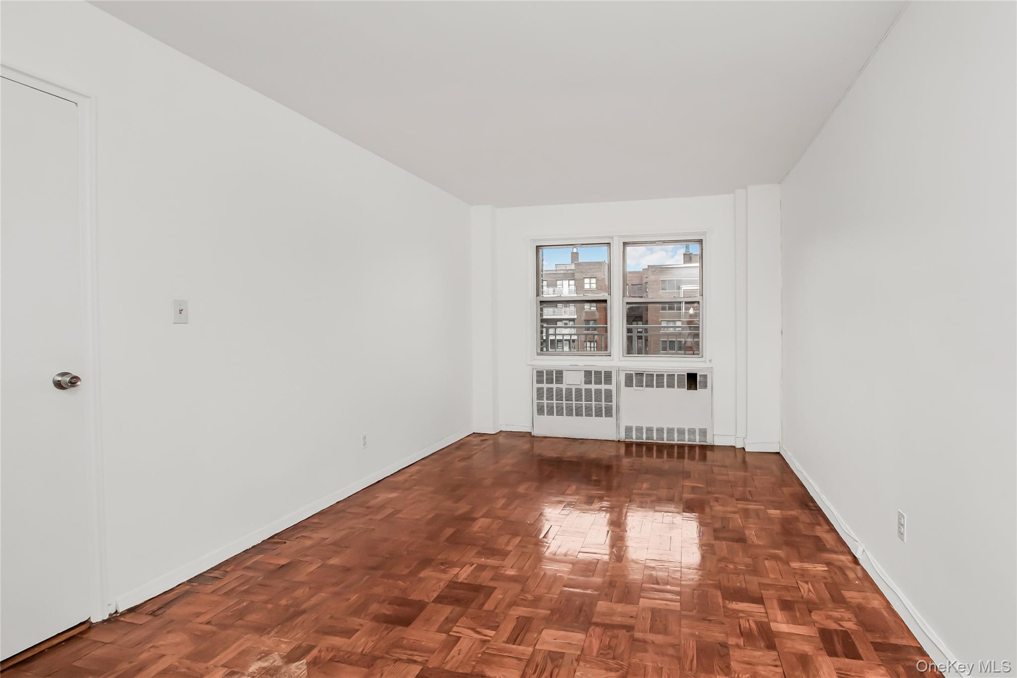 3131 Grand Concourse, Unit 5D Bronx, NY 10468 - Photo 13 of 22 an empty room with windows