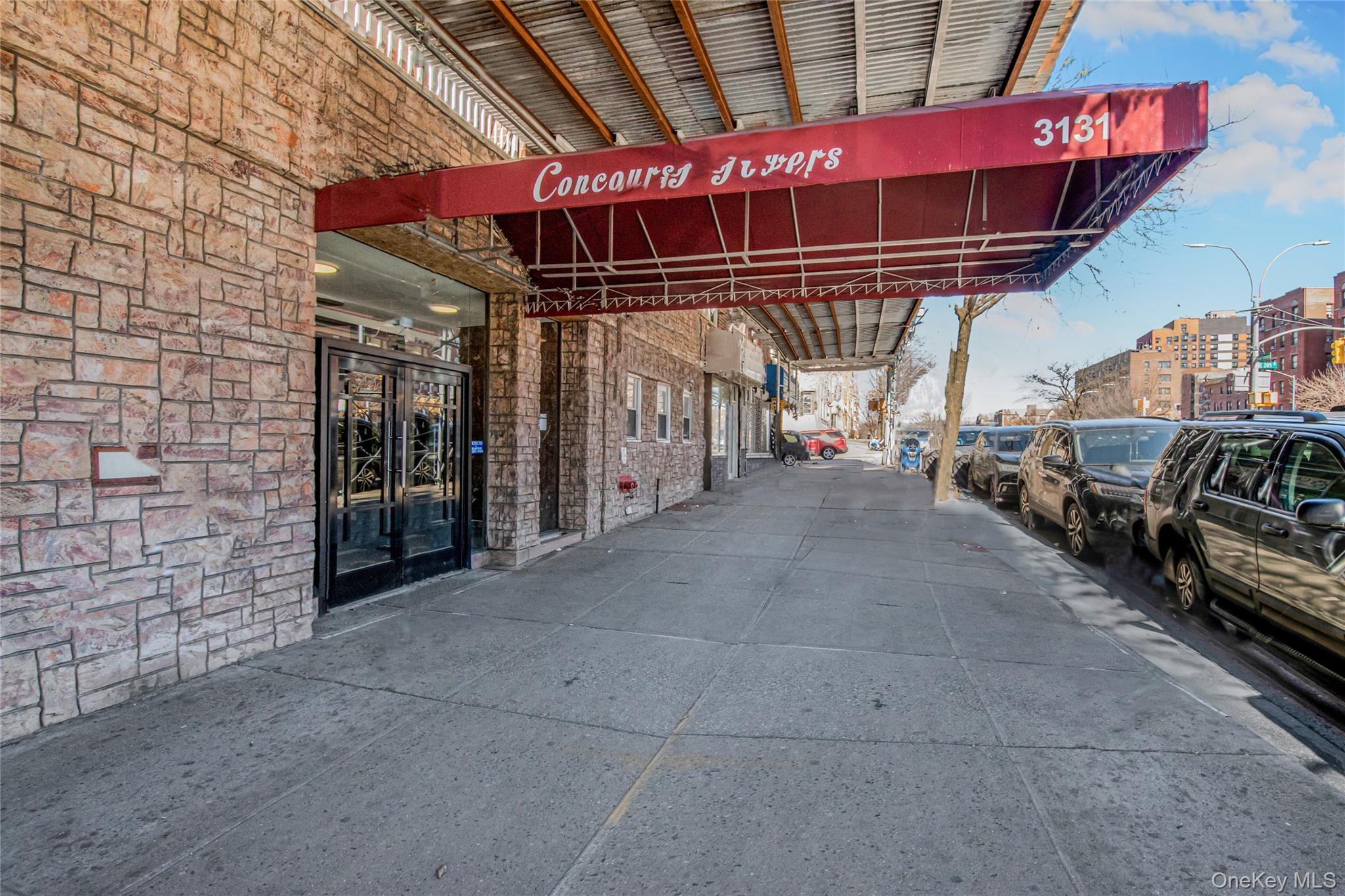 3131 Grand Concourse, Unit 5D Bronx, NY 10468 - Photo 22 of 22 a view of a garage with parked cars