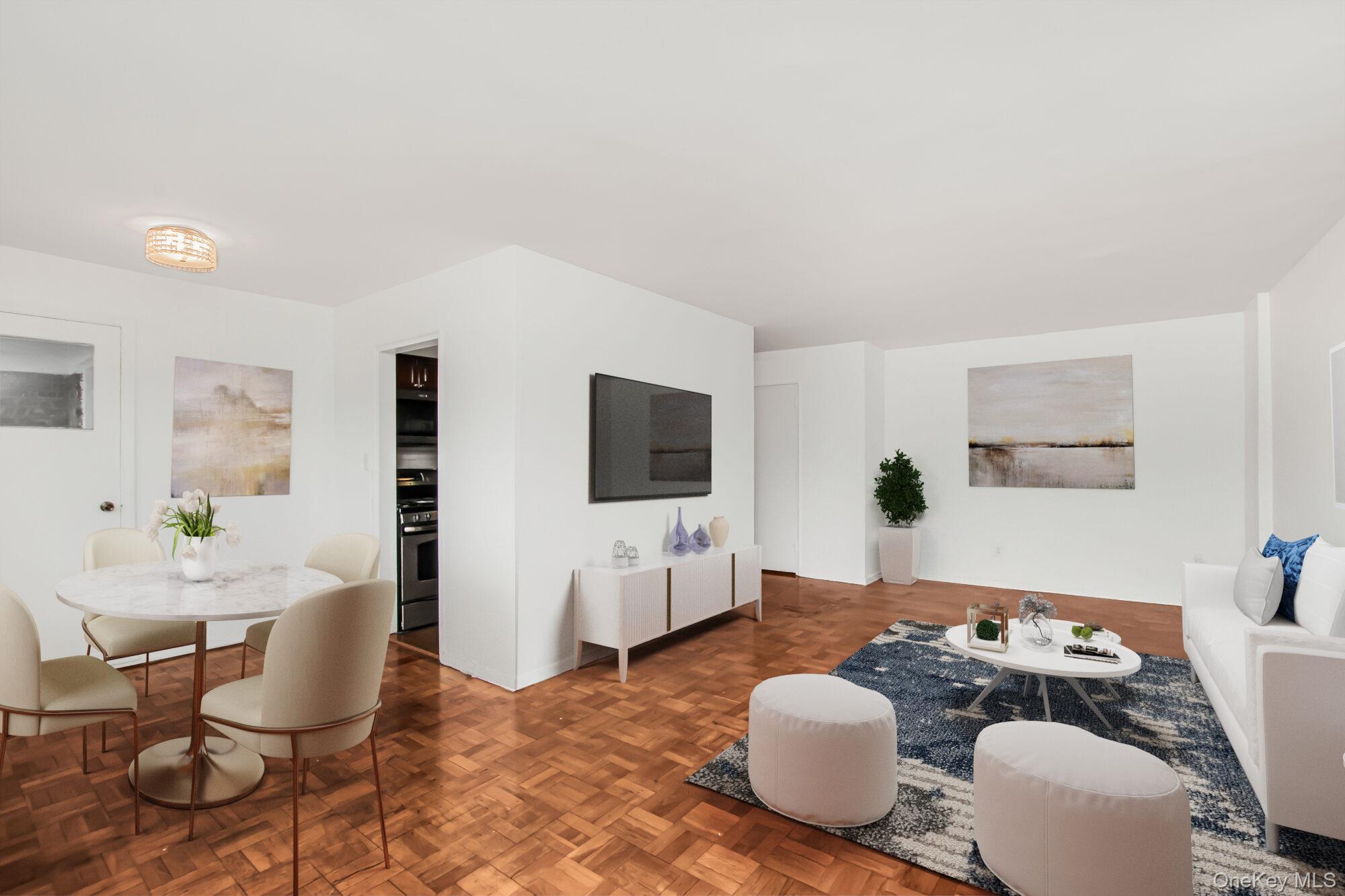 3131 Grand Concourse, Unit 5D Bronx, NY 10468 - Photo 4 of 22 a living room with furniture and a flat screen tv