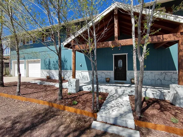 a view of a house with a patio