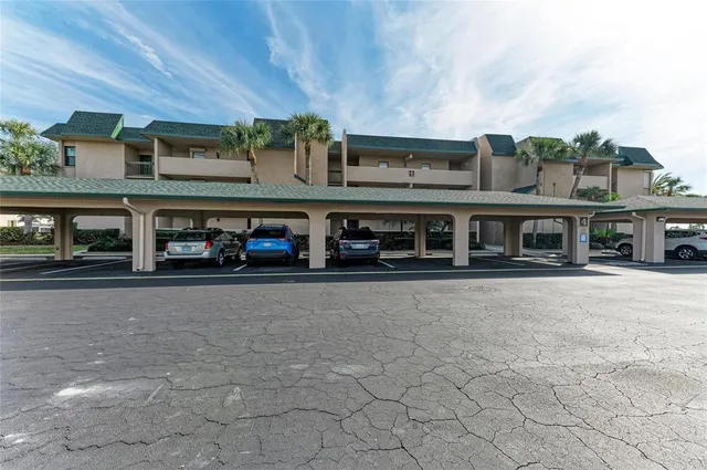 an aerial view of a house with outdoor space