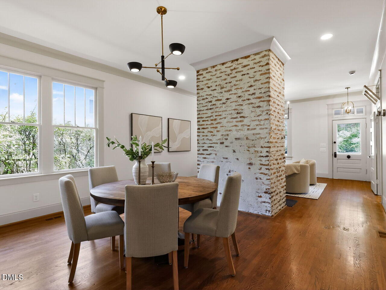 504 Tilden Street Raleigh, NC 27605 - Photo 22 of 58 a view of a dining room with furniture window and wooden floor