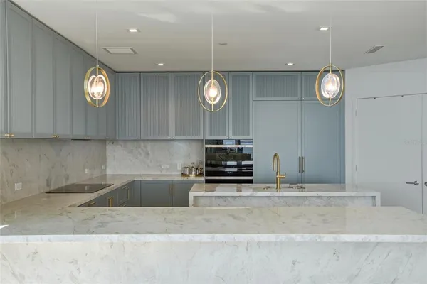 a view of wooden floor and windows in a room