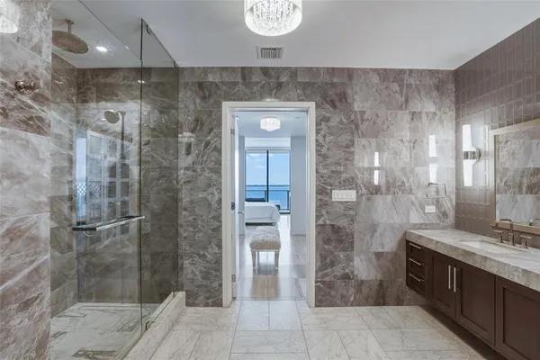 a view of a swimming pool with a patio