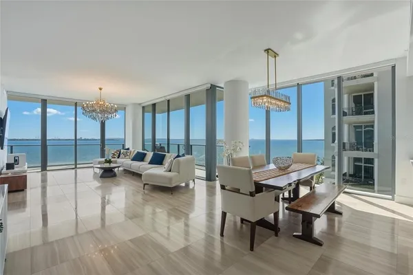 a view of a livingroom with furniture and window