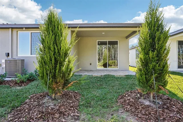 a view of a house with a small garden