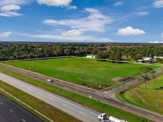 a view of a golf course with a park