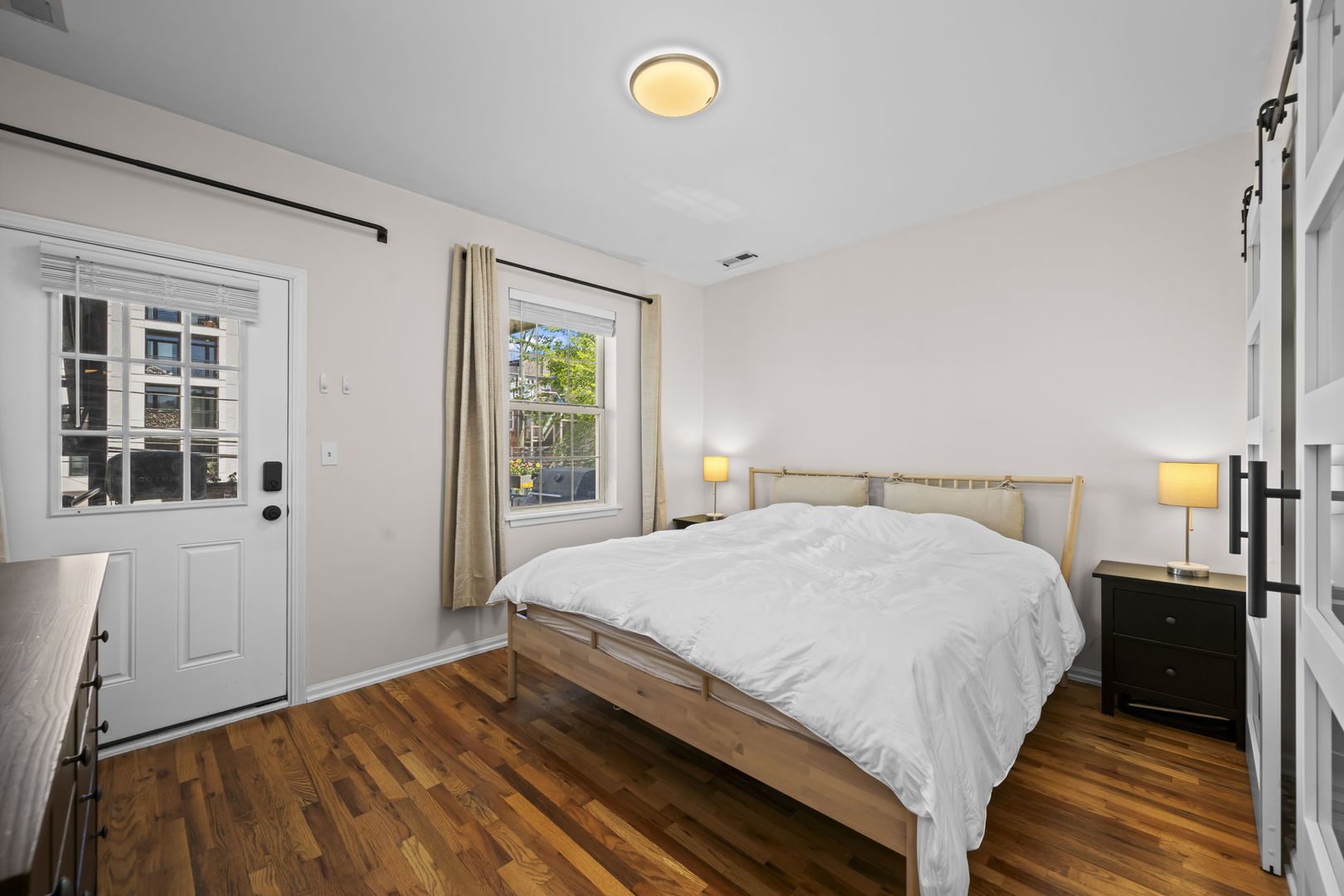 2710 West Haddon Avenue, Unit 2 Chicago, IL 60622 - Photo 9 of 11 a bedroom with a bed and window
