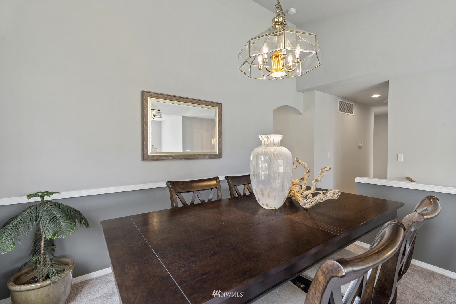 7 167th Place Southwest Bothell, WA 98012 - Photo 7 of 30 a view of a dining room with furniture and chandelier