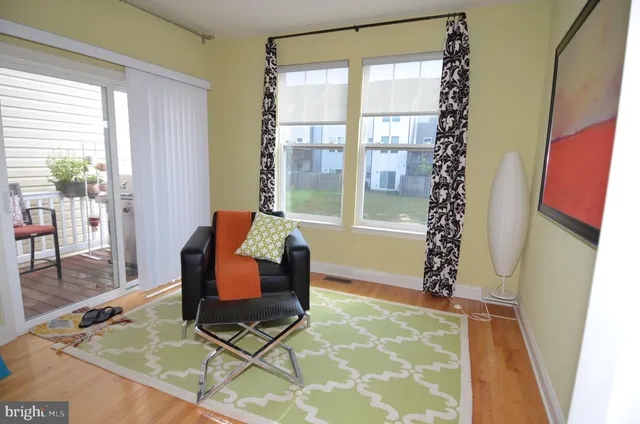 a room with window and furniture