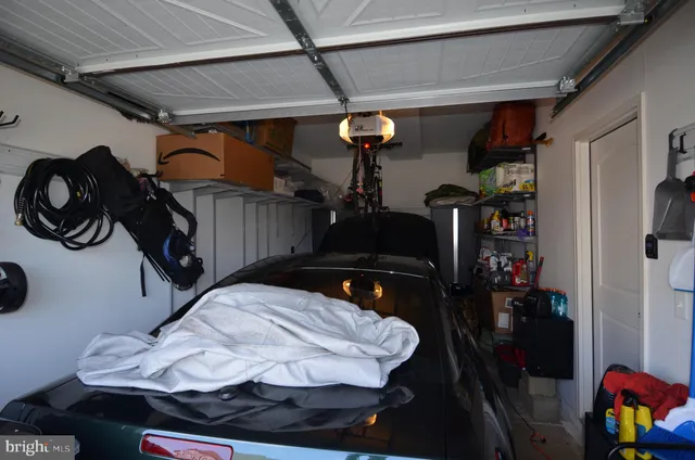 a bedroom with a bed and cabinets