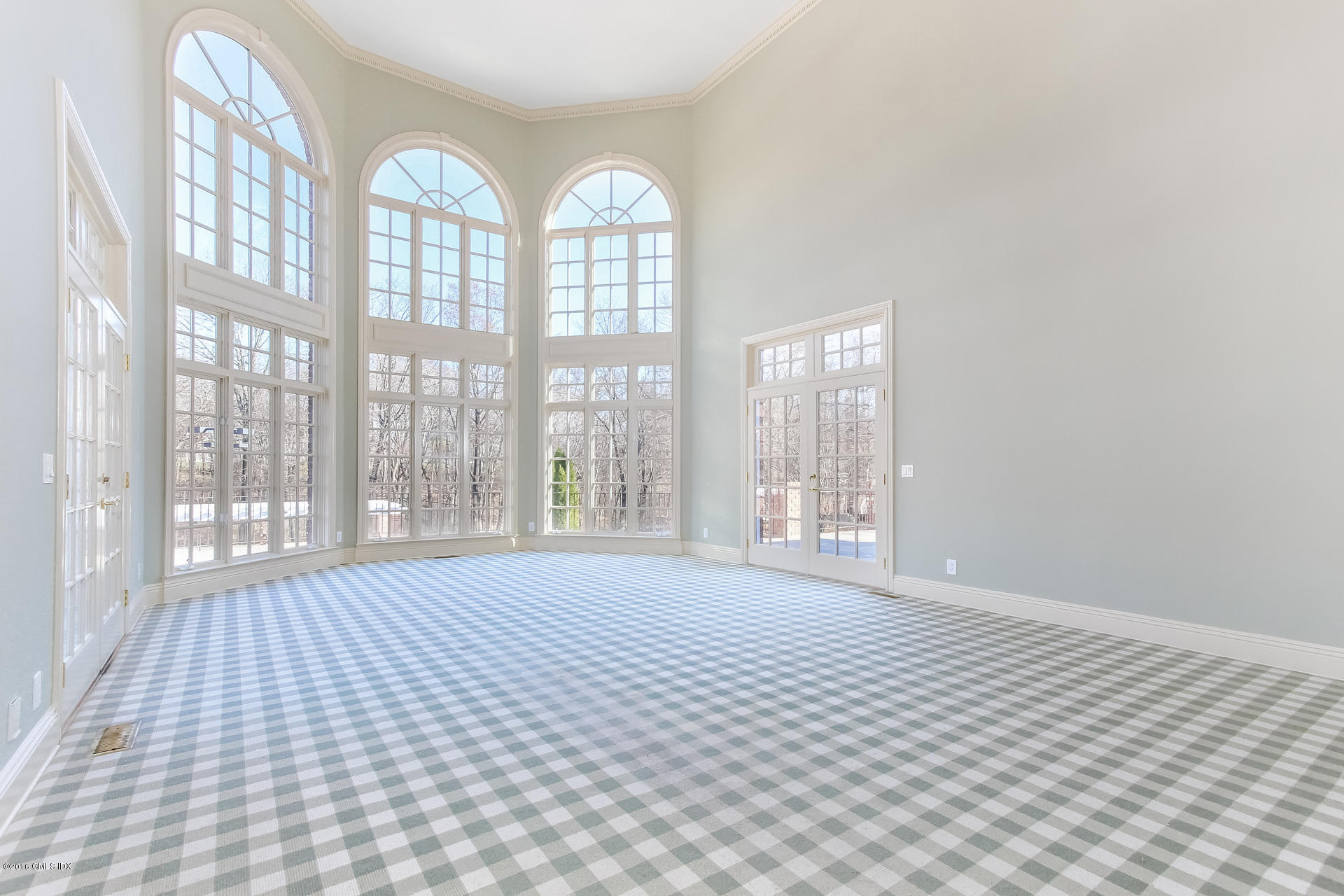591 Round Hill Road Greenwich, CT 06831 - Photo 15 of 51 a view of an empty room with a window