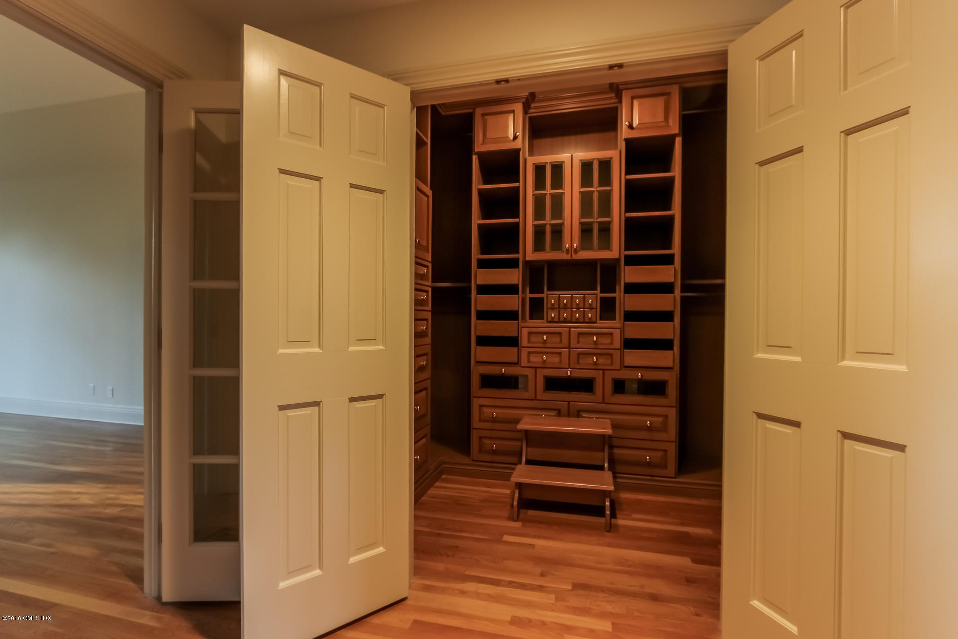 591 Round Hill Road Greenwich, CT 06831 - Photo 27 of 51 a view of walk in closet with empty racks