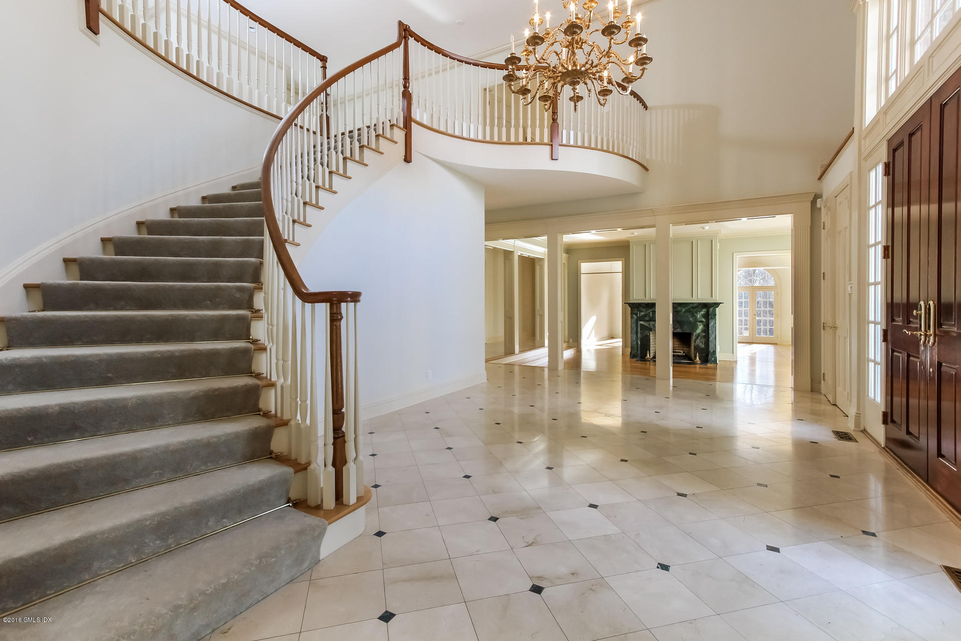 591 Round Hill Road Greenwich, CT 06831 - Photo 5 of 51 a view of entryway and hall with wooden floor