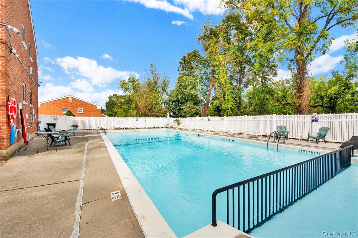 1879 Crompond Road, Unit G10 Peekskill, NY 10566 - Photo 16 of 18 swimming pool view with seating space
