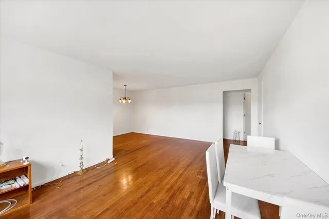 a bedroom with a bed and a table