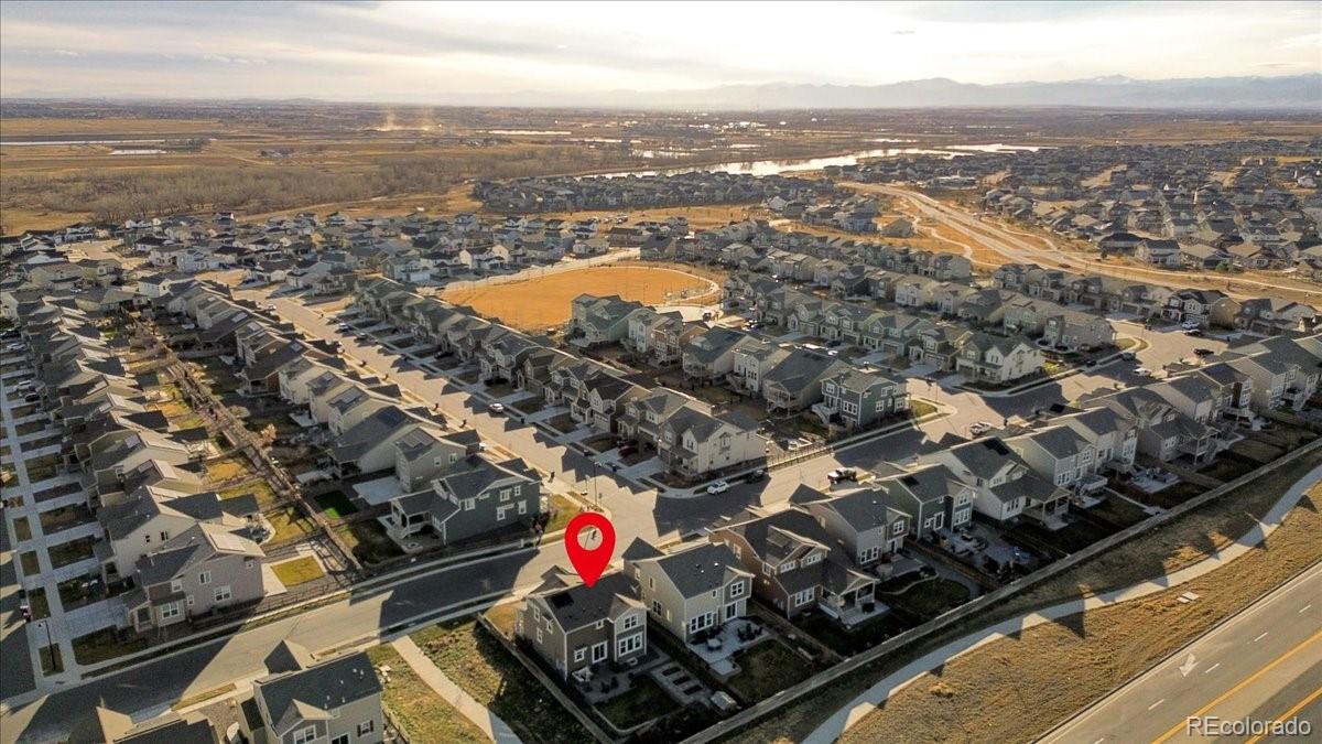 5453 Inland Avenue Firestone, CO 80504 - Photo 42 of 49 an aerial view of residential houses with outdoor space