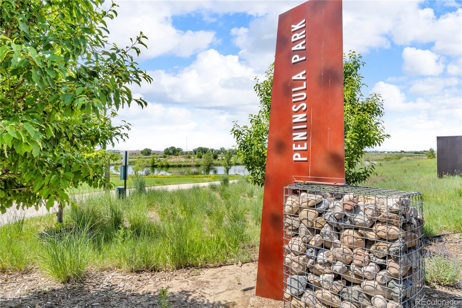 5453 Inland Avenue Firestone, CO 80504 - Photo 46 of 49 a view of a lake with a big yard
