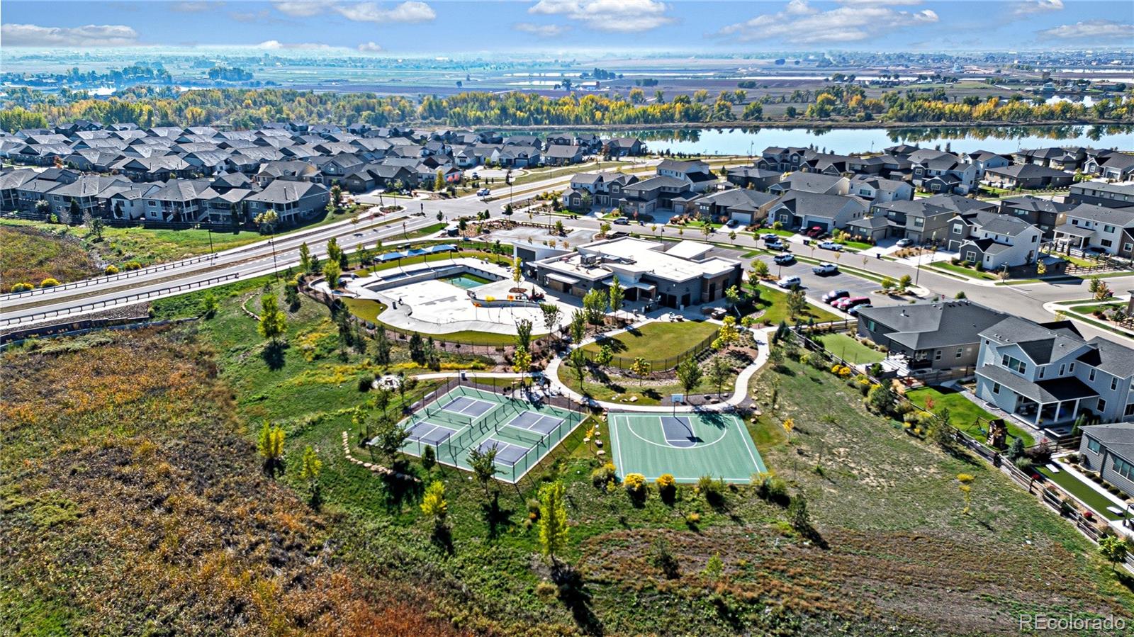 5453 Inland Avenue Firestone, CO 80504 - Photo 48 of 49 an aerial view of a residential houses with outdoor space and street view