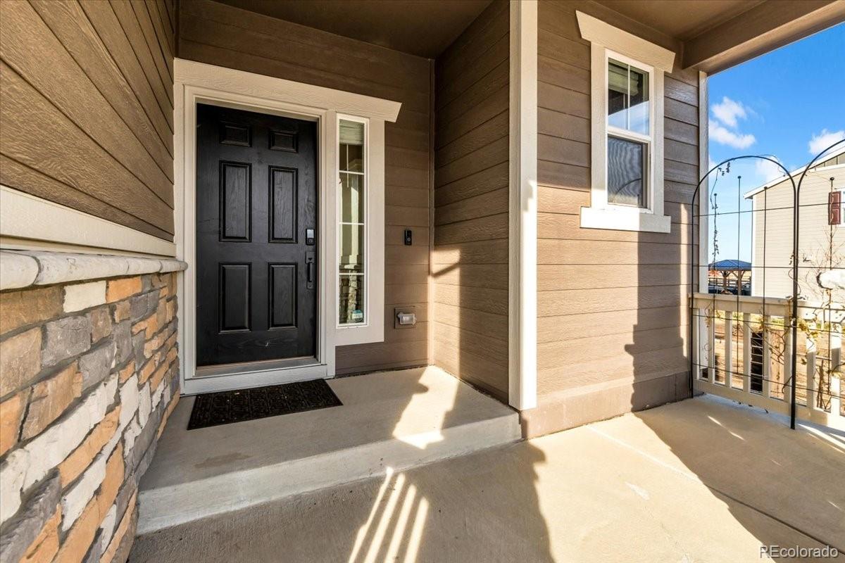 5453 Inland Avenue Firestone, CO 80504 - Photo 5 of 49 a view of front door of house