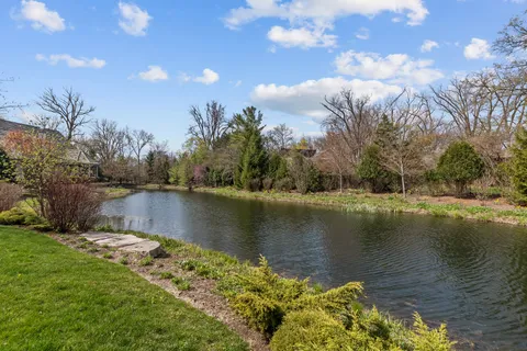 a view of lake with green space
