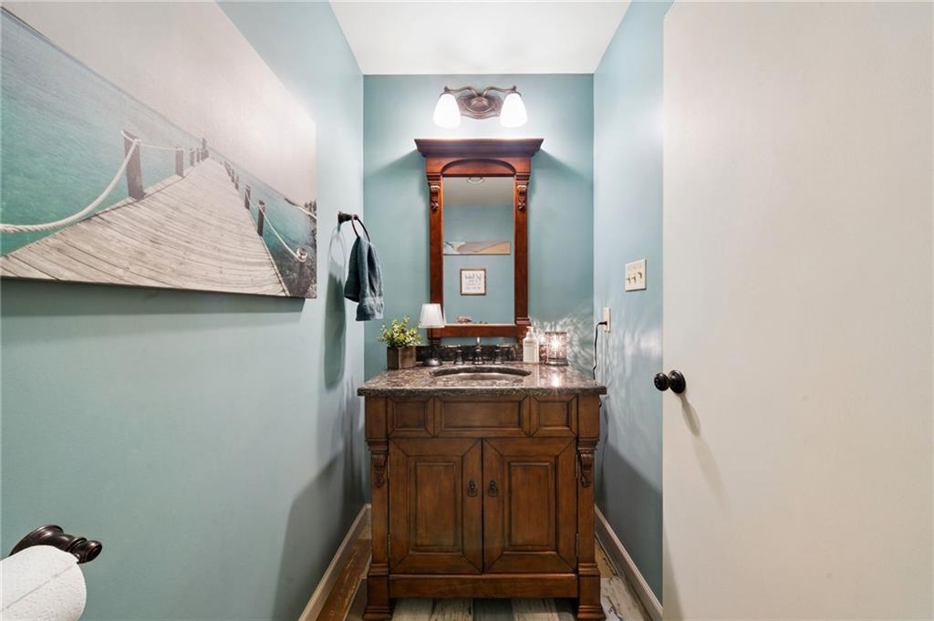 55 Spring Valley Drive Washington, PA 15301 - Photo 16 of 36 a bathroom with a sink mirror and vanity