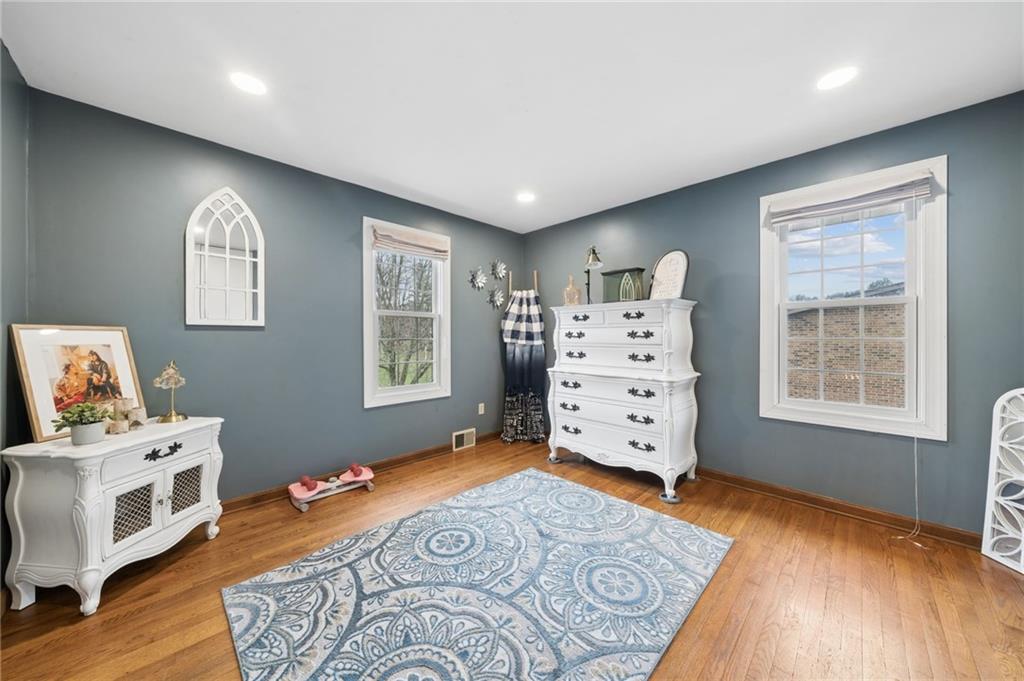 55 Spring Valley Drive Washington, PA 15301 - Photo 18 of 36 a view of a bedroom with furniture and wooden floor