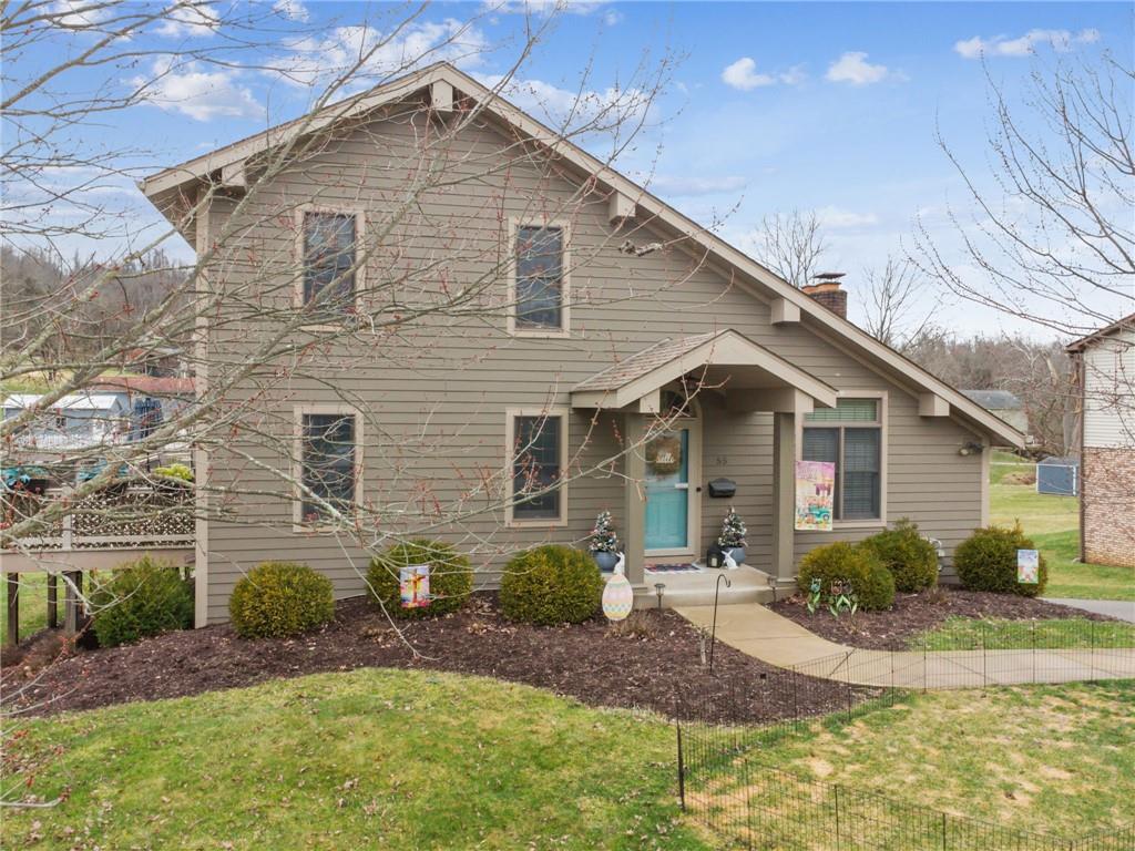 55 Spring Valley Drive Washington, PA 15301 - Photo 2 of 36 a front view of a house with garden