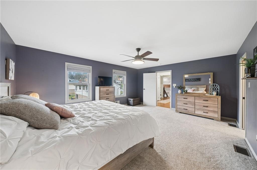 55 Spring Valley Drive Washington, PA 15301 - Photo 26 of 36 a bedroom with a large bed and dresser