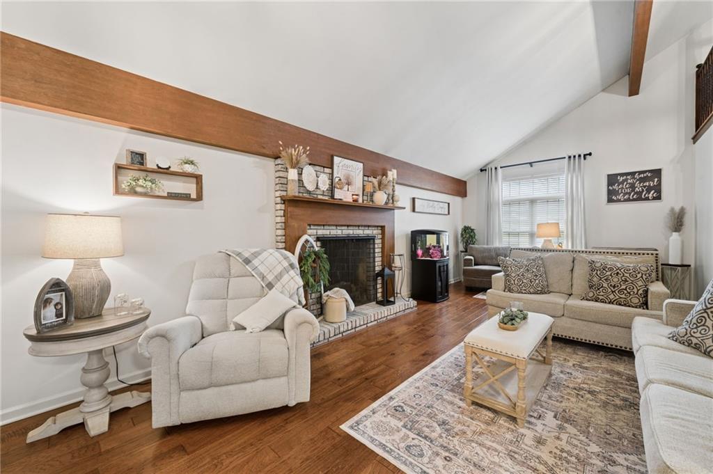 55 Spring Valley Drive Washington, PA 15301 - Photo 3 of 36 a living room with furniture and a fireplace