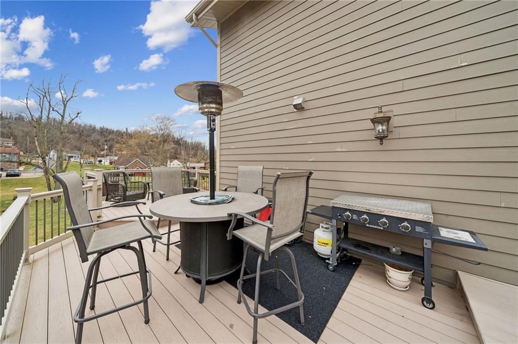 55 Spring Valley Drive Washington, PA 15301 - Photo 32 of 36 a view of a terrace with furniture and stove