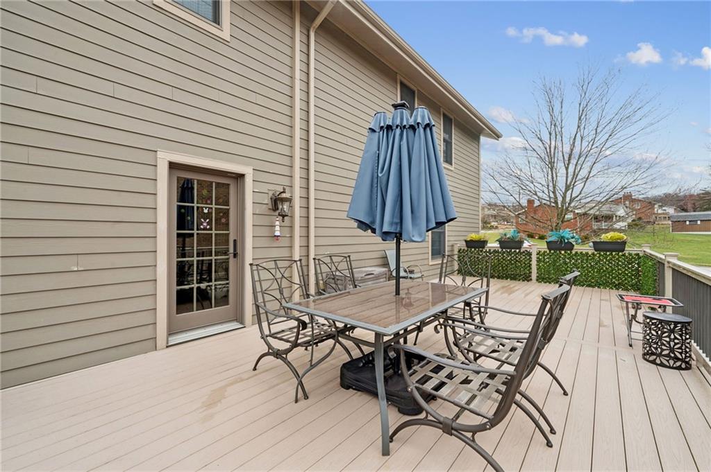 55 Spring Valley Drive Washington, PA 15301 - Photo 33 of 36 a view of a table and chairs in patio of the house