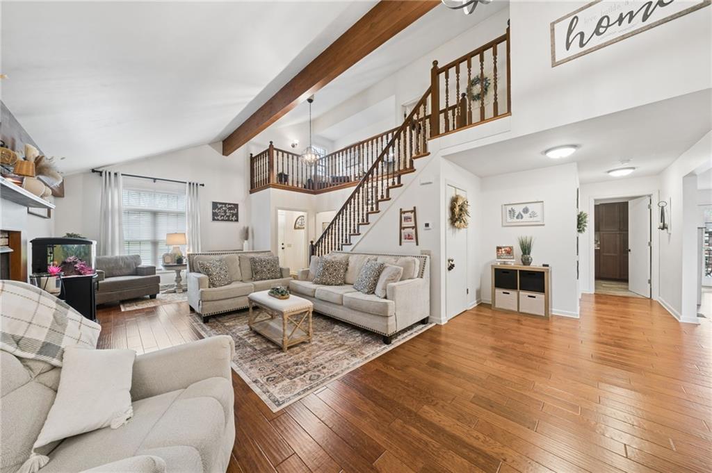 55 Spring Valley Drive Washington, PA 15301 - Photo 4 of 36 a living room with furniture and a fireplace
