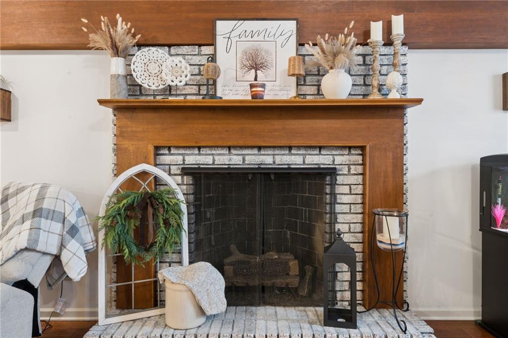 55 Spring Valley Drive Washington, PA 15301 - Photo 6 of 36 a room with fireplace and potted plants