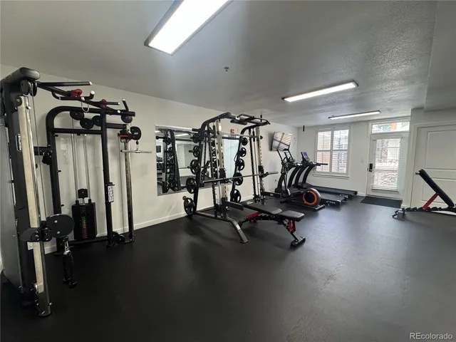 a view of barbeque area with seating space