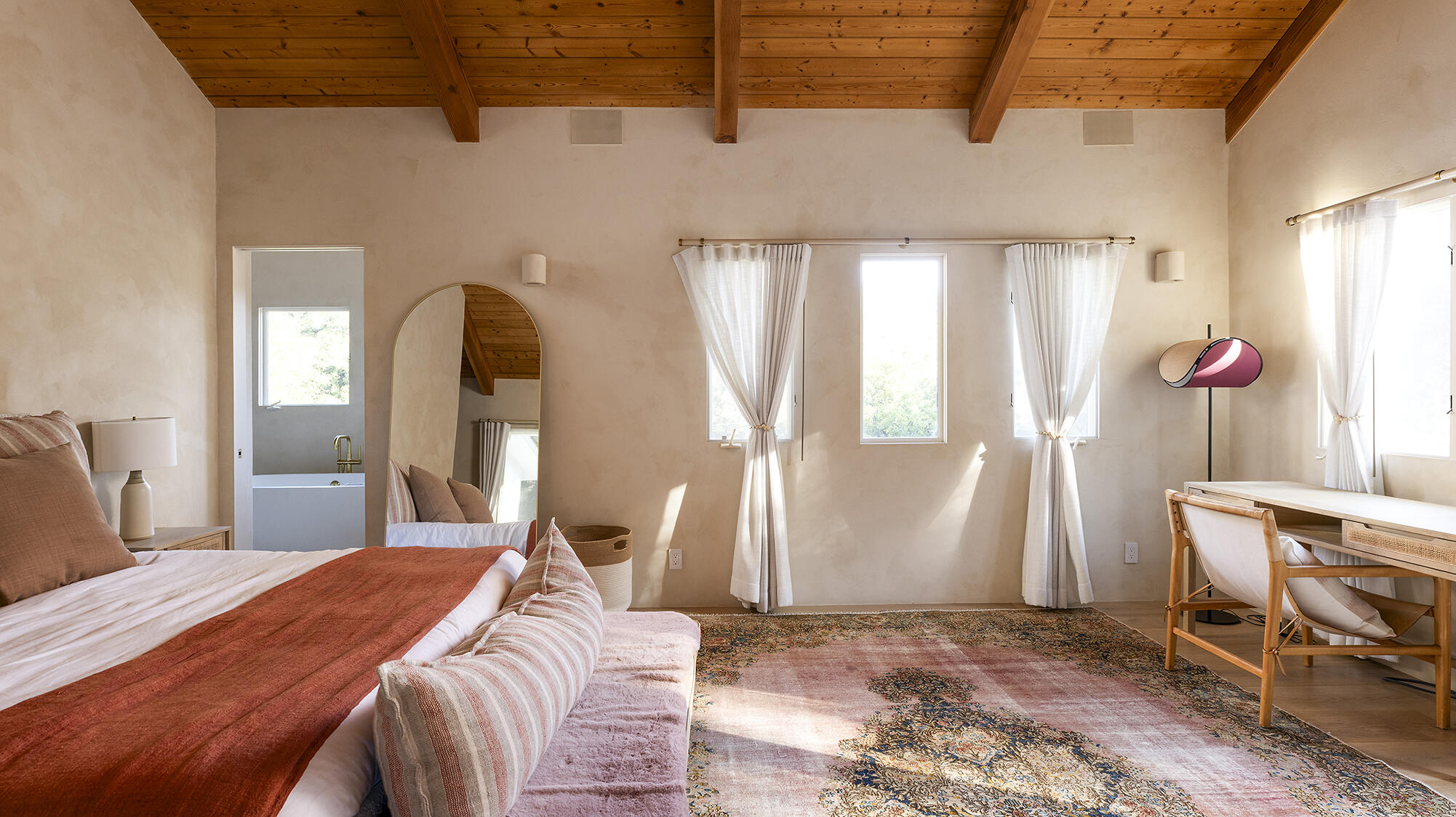 1545 San Roque Road Santa Barbara, CA 93105 - Photo 22 of 60 a bedroom with a bed a desk and chair