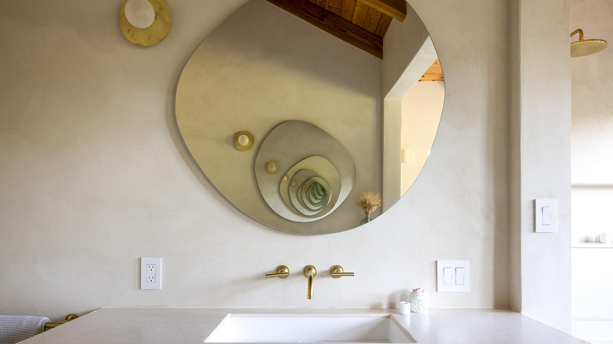 1545 San Roque Road Santa Barbara, CA 93105 - Photo 26 of 60 a bathroom with a sink and a mirror