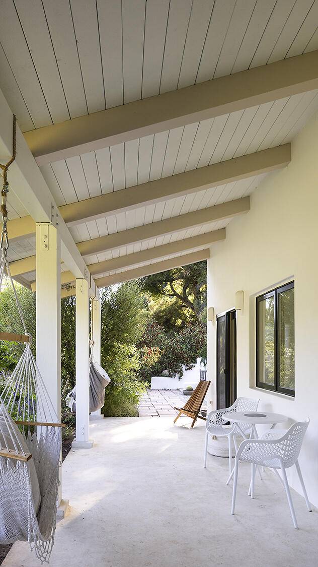 1545 San Roque Road Santa Barbara, CA 93105 - Photo 32 of 60 a view of a patio with table and chairs in front of a window