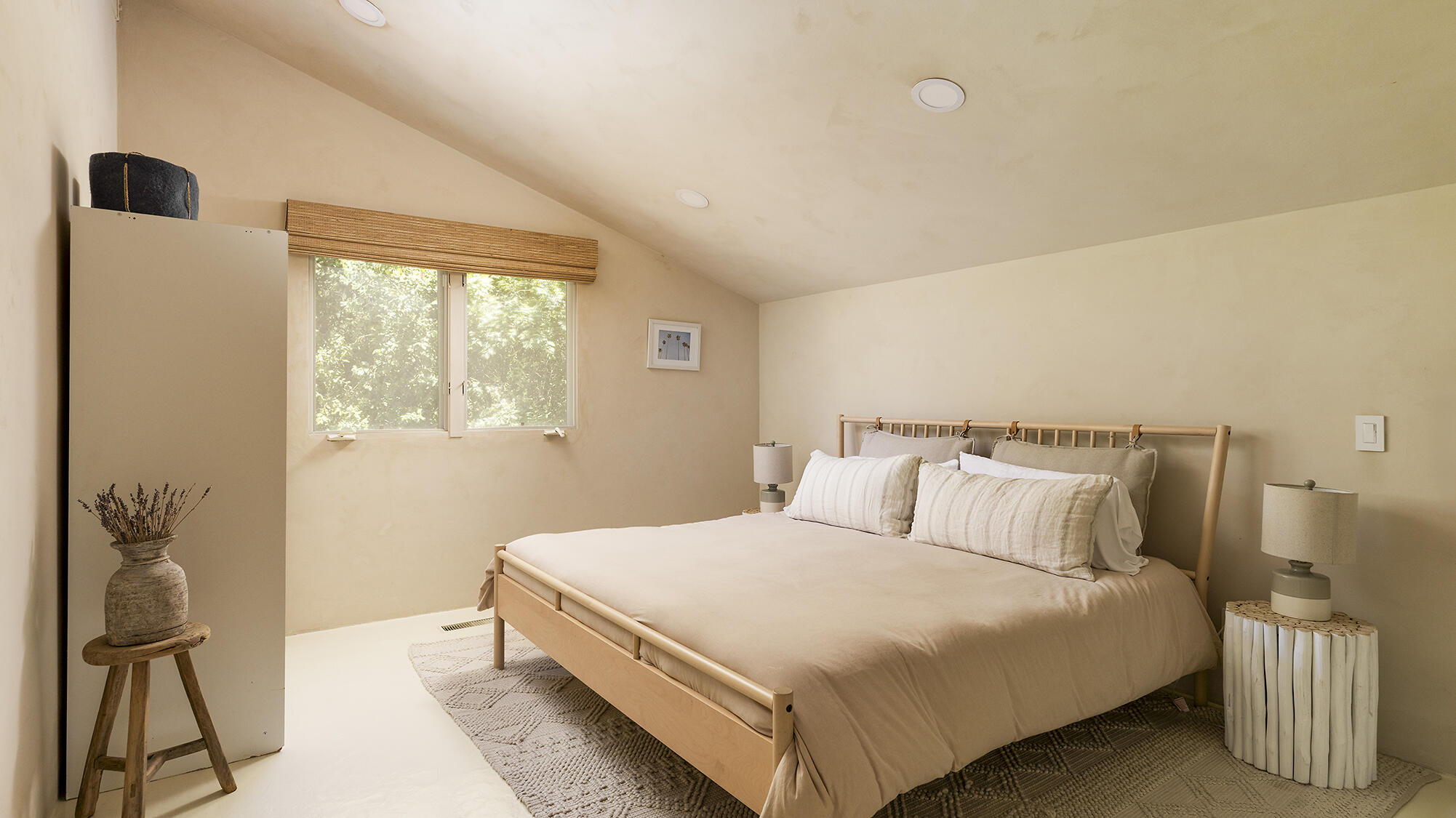 1545 San Roque Road Santa Barbara, CA 93105 - Photo 42 of 60 a bedroom with a bed and wooden floor