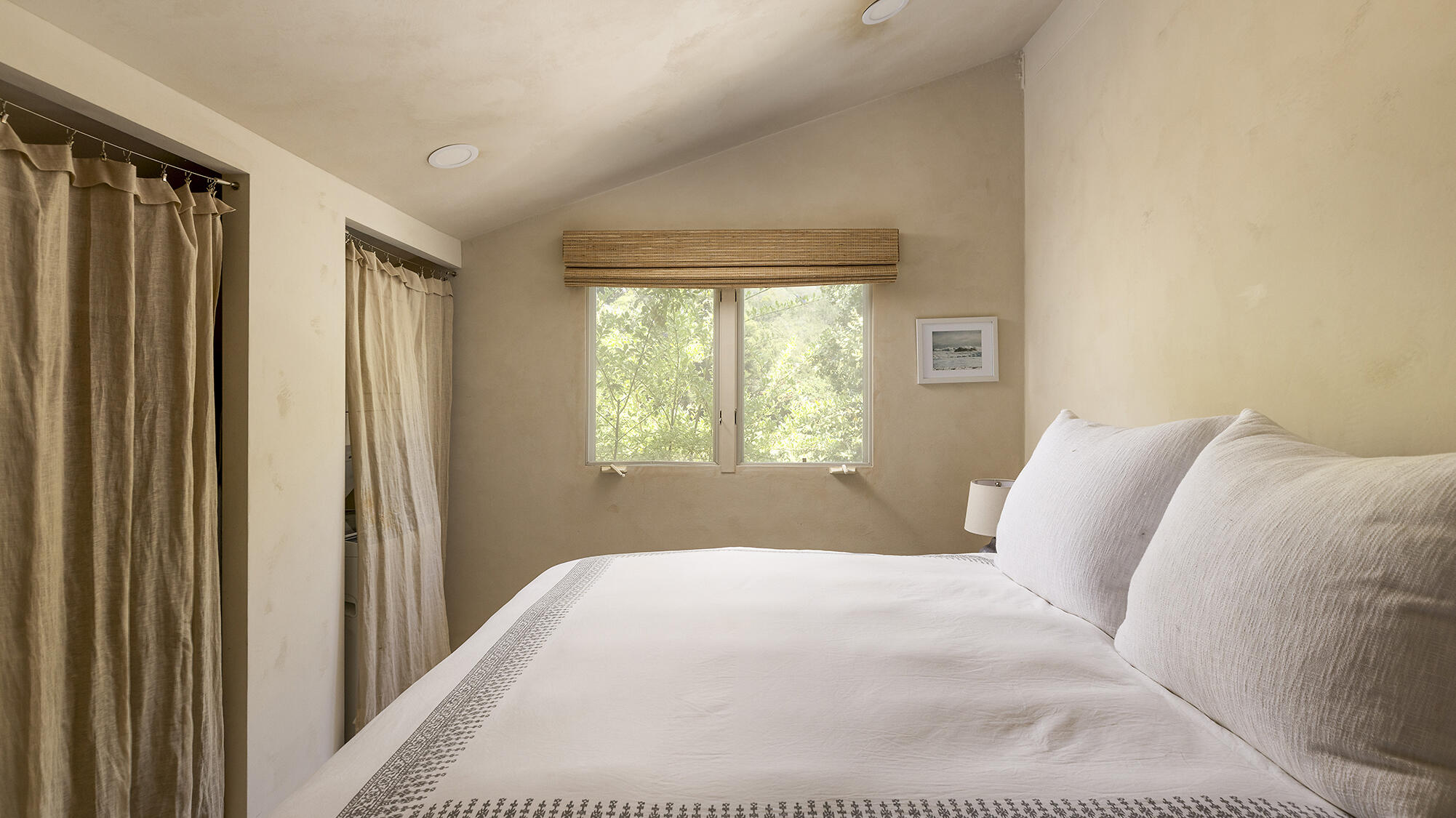 1545 San Roque Road Santa Barbara, CA 93105 - Photo 44 of 60 a bedroom with a bed and a window