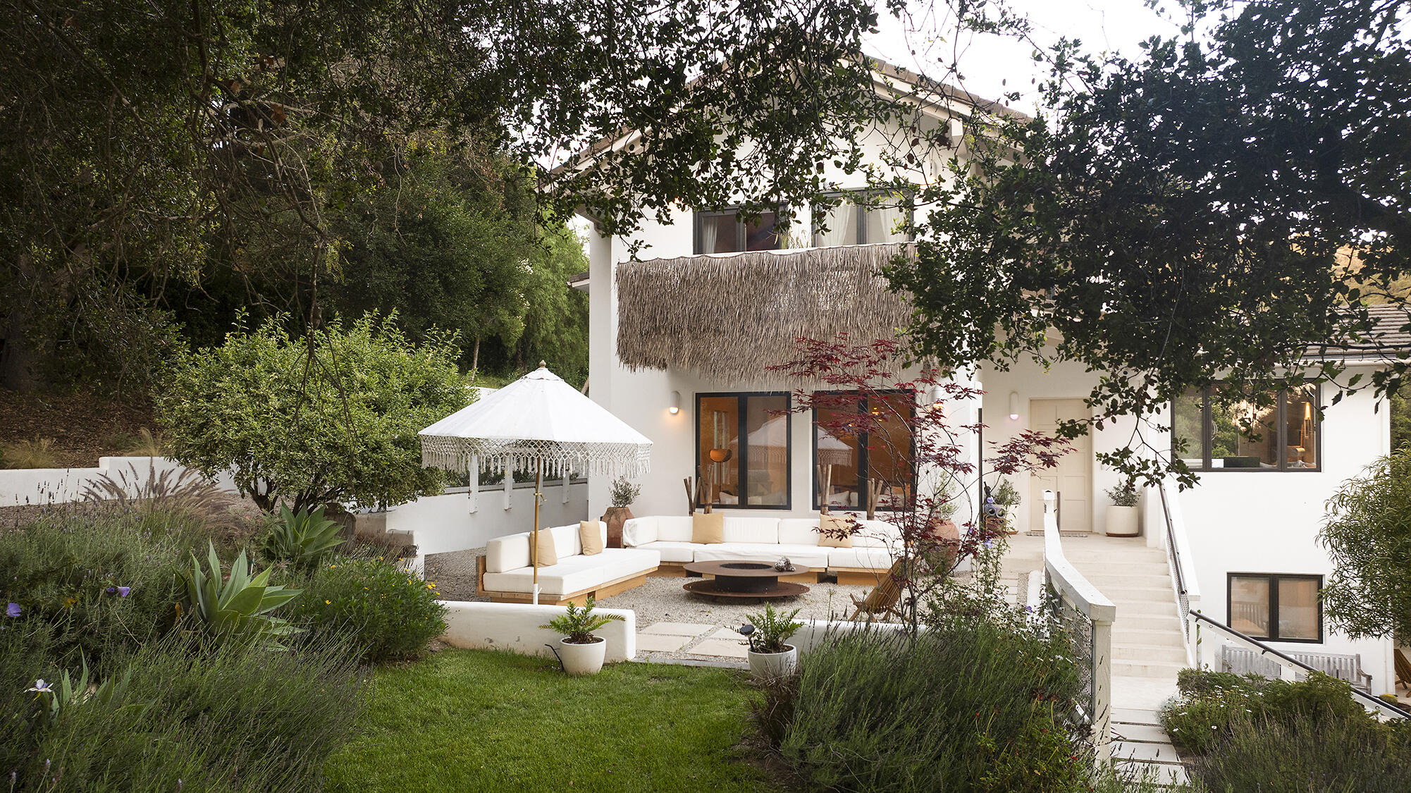 1545 San Roque Road Santa Barbara, CA 93105 - Photo 5 of 60 a front view of a house with sitting area and garden